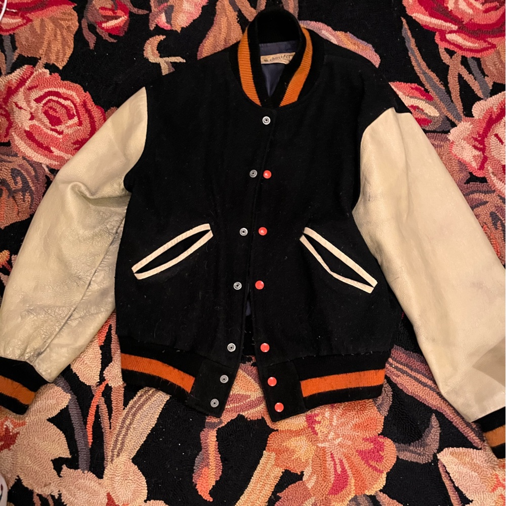 Black and Cream Varsity Jacket with Orange Accents